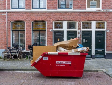 Cluttered garage being cleared by professionals in Seven Sisters