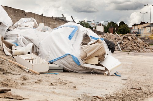 Customer service assisting with skip hire